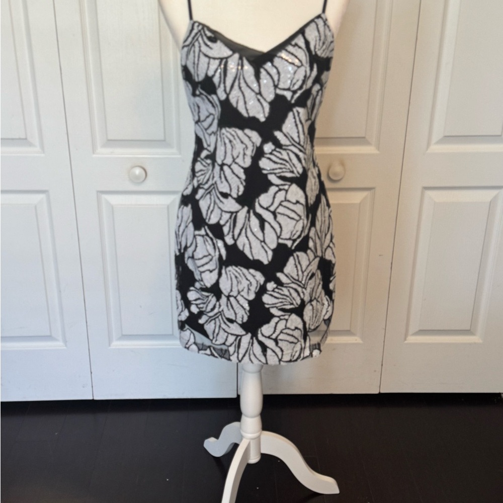 Black and white sequined party dress